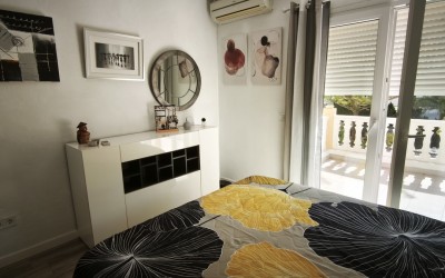 A fully renovated corner bungalow with a large garden.
